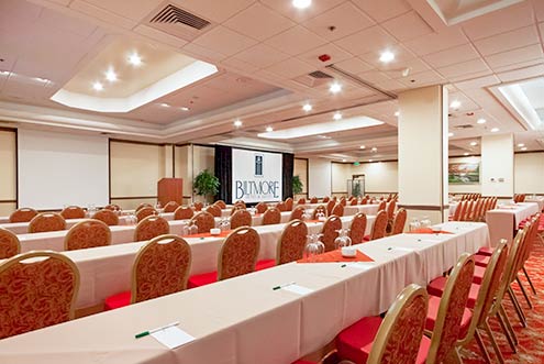 One of our expansive meeting rooms filled with tables and chairs